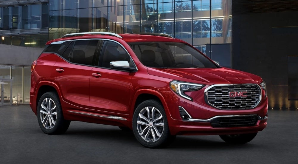 Red 2020 GMC Terrain parked near a used GMC dealer