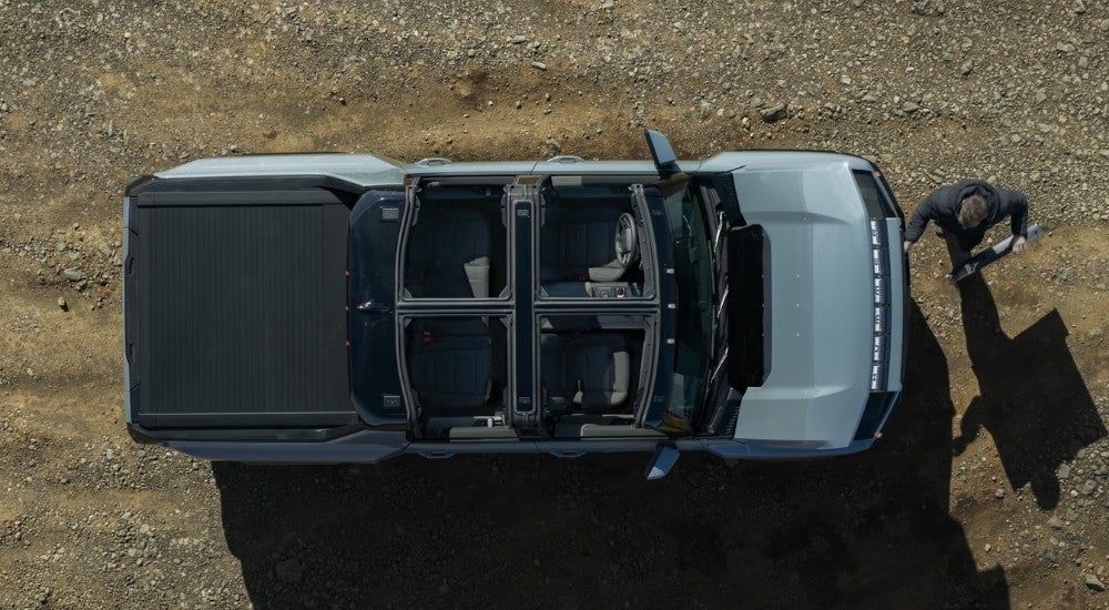 Aerial view a blue 2025 GMC Hummer EV Pickup