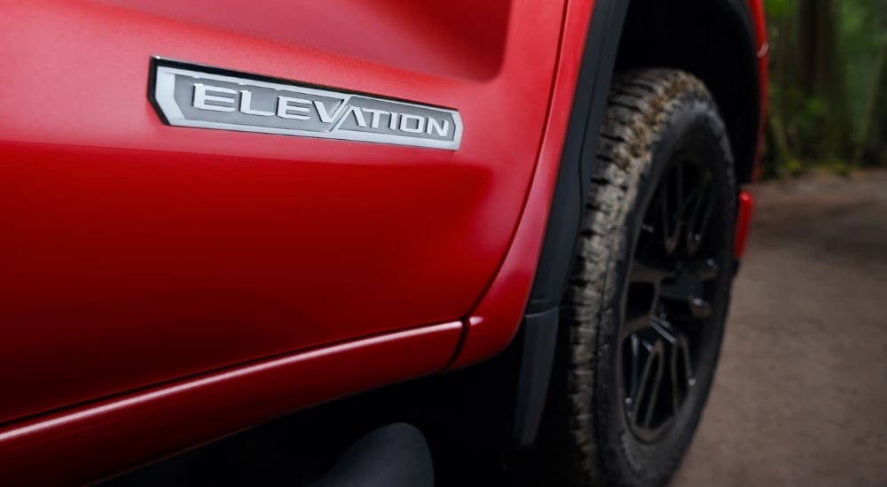 Elevation badge on a red 2025 GMC Sierra 1500 Elevation