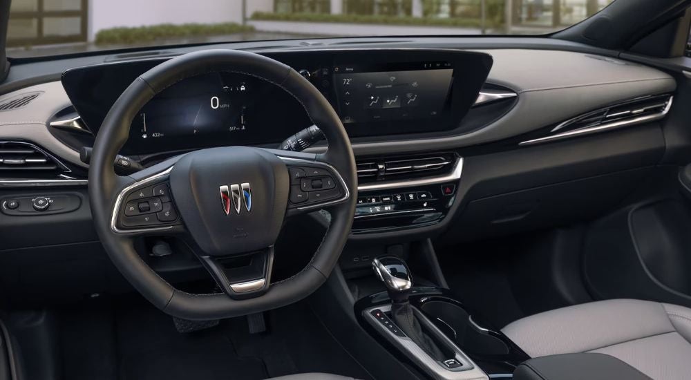 Black dash and infotainment screen in a 2024 Buick Envista Avenir