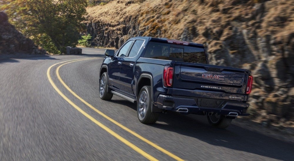 blue 2025 GMC Sierra 1500 Denali shown from the rear