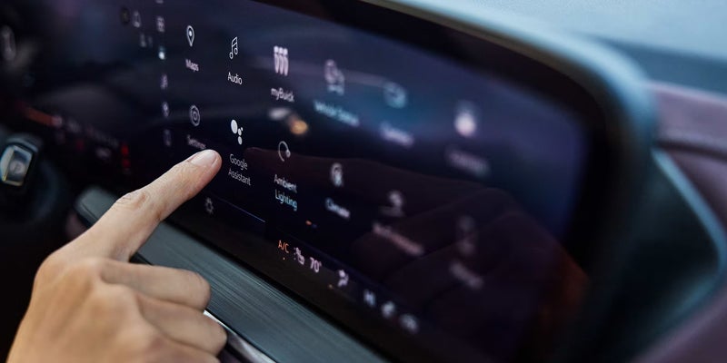 2026 Buick Envision showcasing advanced technology features including a digital cockpit and touchscreen infotainment system at Stadium Buick GMC in Salem, OH.