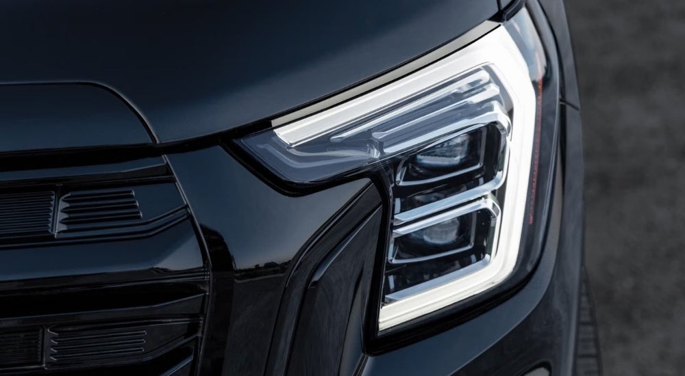 Driver side headlight on a black 2025 GMC Terrain for sale