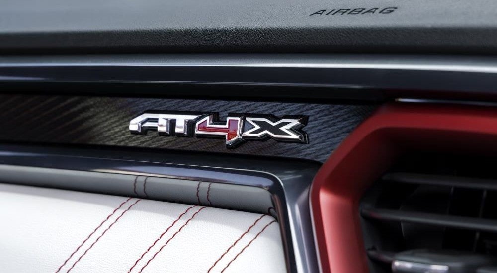 Close-up on the badging of a 2025 GMC Canyon AT4X for sale