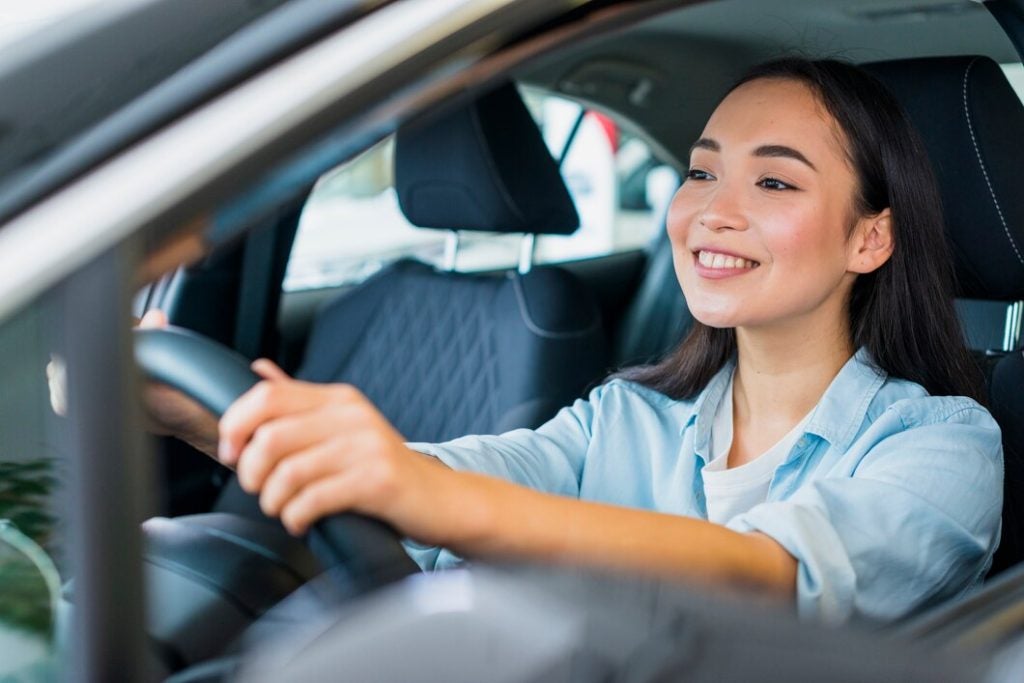 Woman behind the wheel of a car