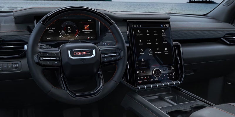 2026 GMC Acadia technology interior with digital driver display, large touchscreen, and advanced connectivity features at Country Club GMC in Oneonta, NY.