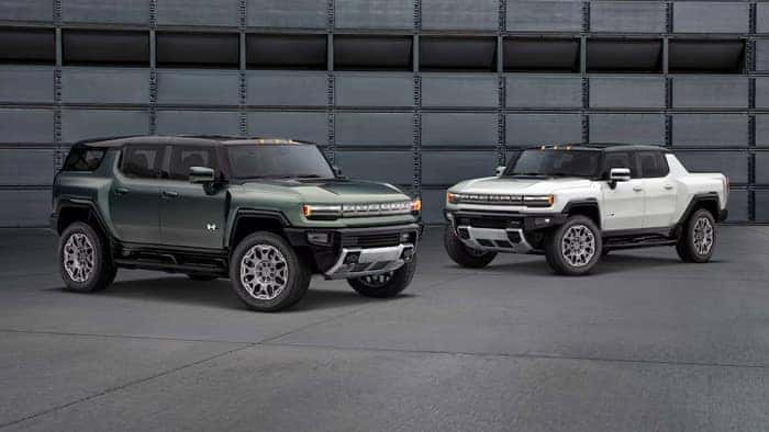 Two Hummer EVs Parked in a Garage