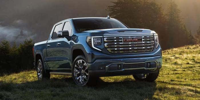 Blue GMC Sierra facing the right