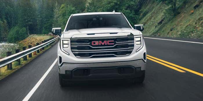 GMC Sierra 1500 driving on the road