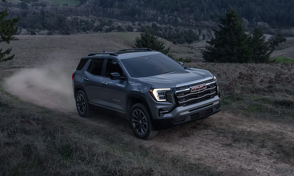 Gray 2027 GMC Terrain driving off-road
