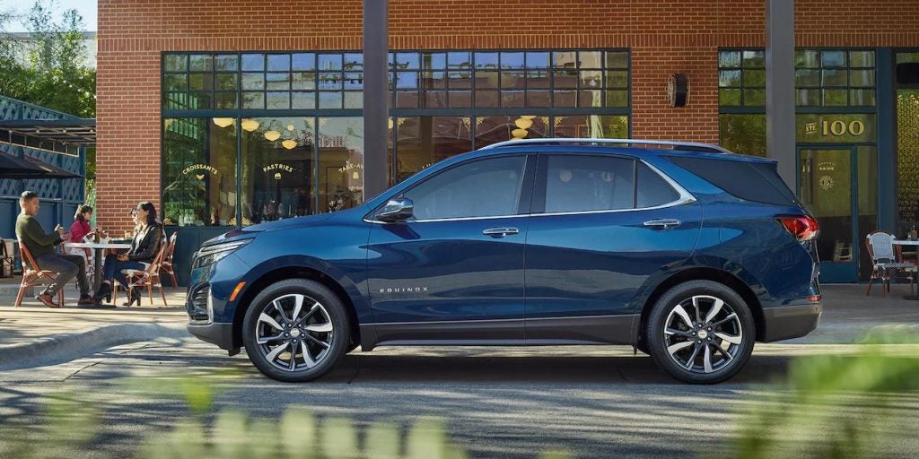 A side-profile view of a blue 2022 Chevrolet Equniox.
