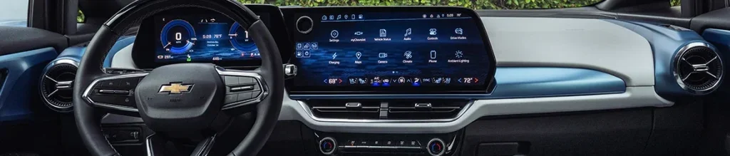 Chevrolet interior dashboard featuring digital instrument cluster and infotainment touchscreen with steering wheel view.