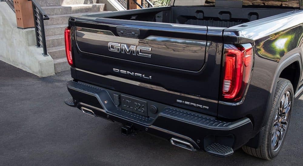 The bed of a black 2024 GMC Sierra 1500 Denali is shown.