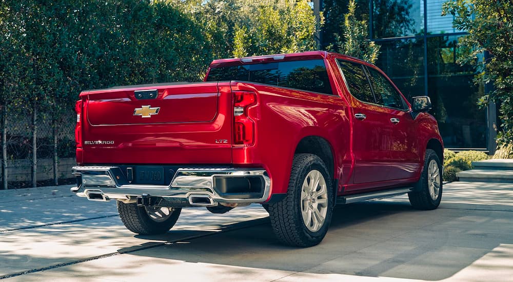 The tailgate on a red 2024 Chevy Silverado 1500 LTZ is shown.