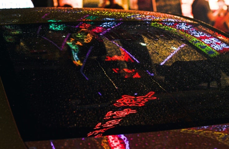 Reflection of rain with car windows tinted