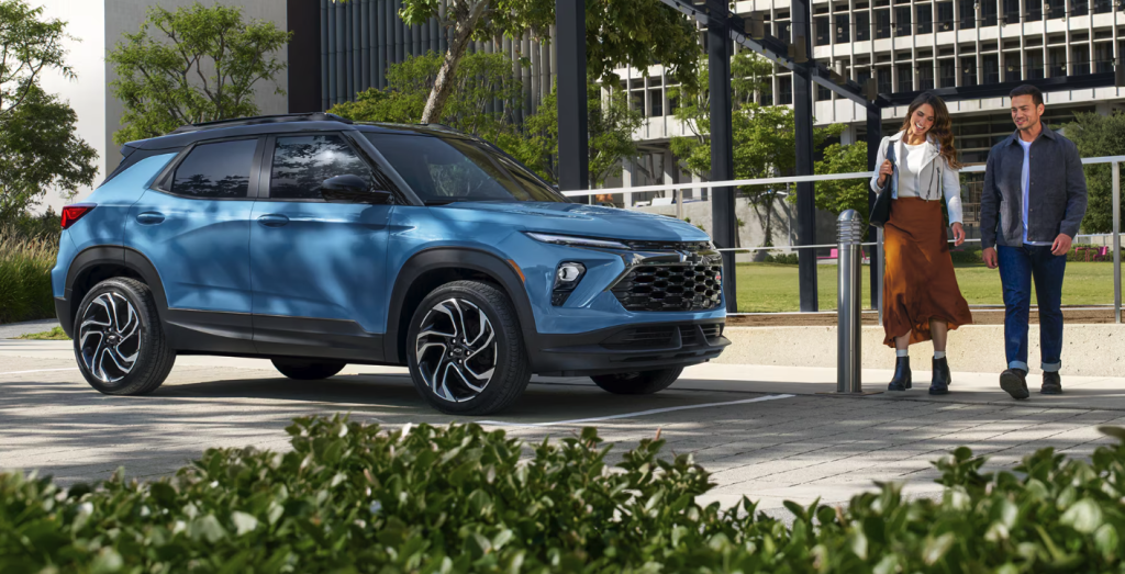 2026 Chevrolet Trailblazer exterior in blue parked with rear cargo area open