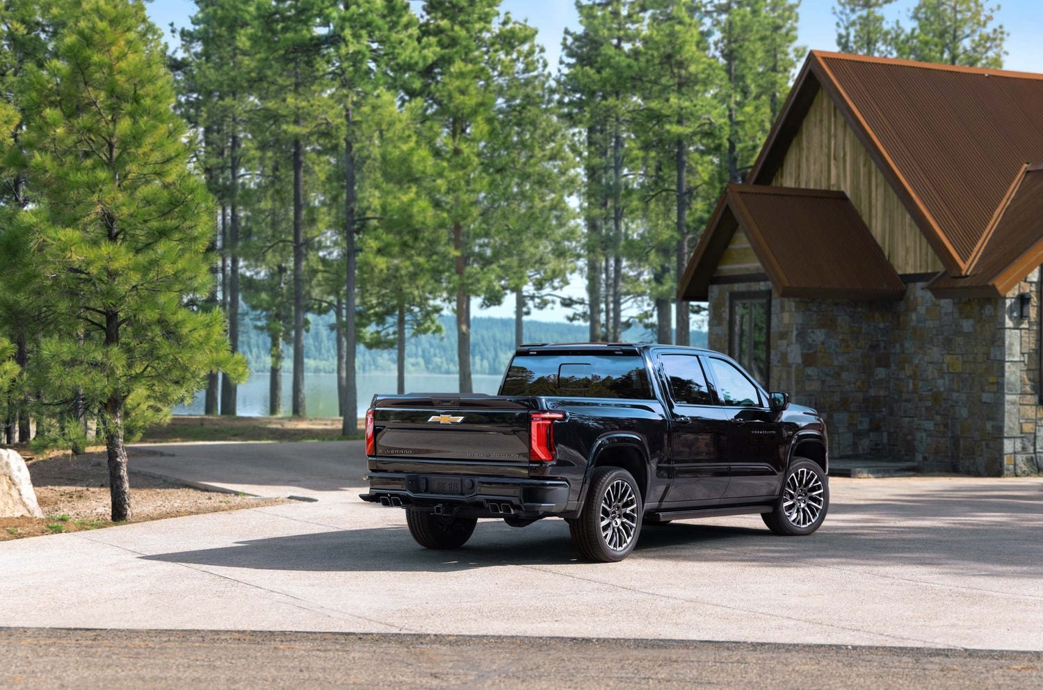 2027 Chevrolet Silverado 1500 High Country rear three-quarter on 22-inch wheels