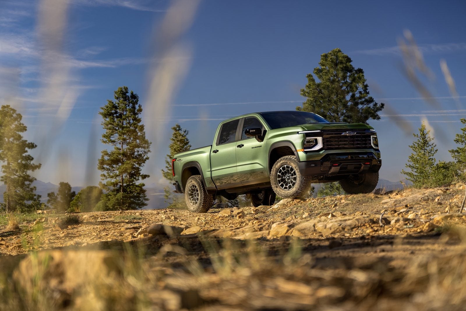 2027 Chevrolet Silverado 1500 Trail Boss with off-road hood and 34-inch tires