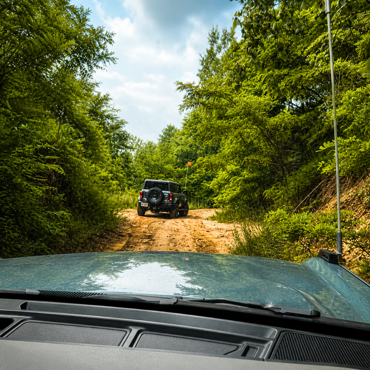 Bronco following trail from driver view