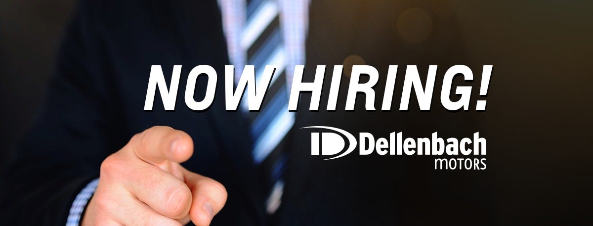 Businessman pointing forward, with text "NOW HIRING!" and the Dellenbach Motors logo.