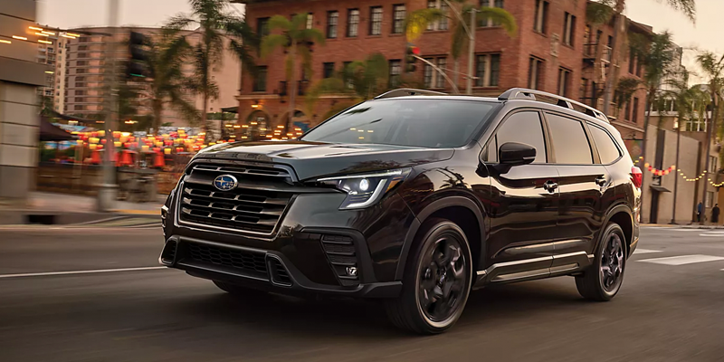 Black 2026 Subaru Ascent in Onyx Edition trim driving in downtown area of Idaho Falls, ID
