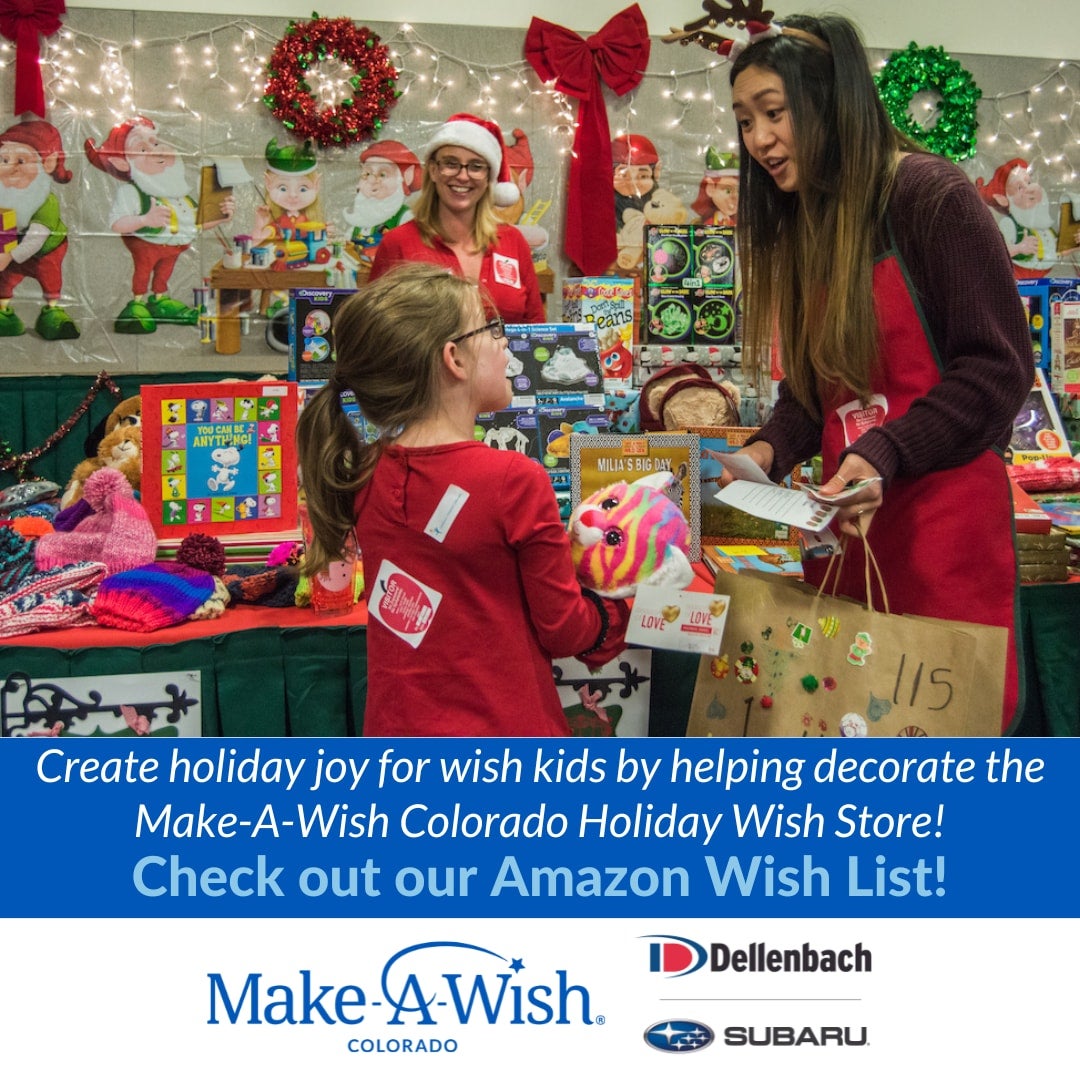 Volunteer helps a child at Make-A-Wish store.