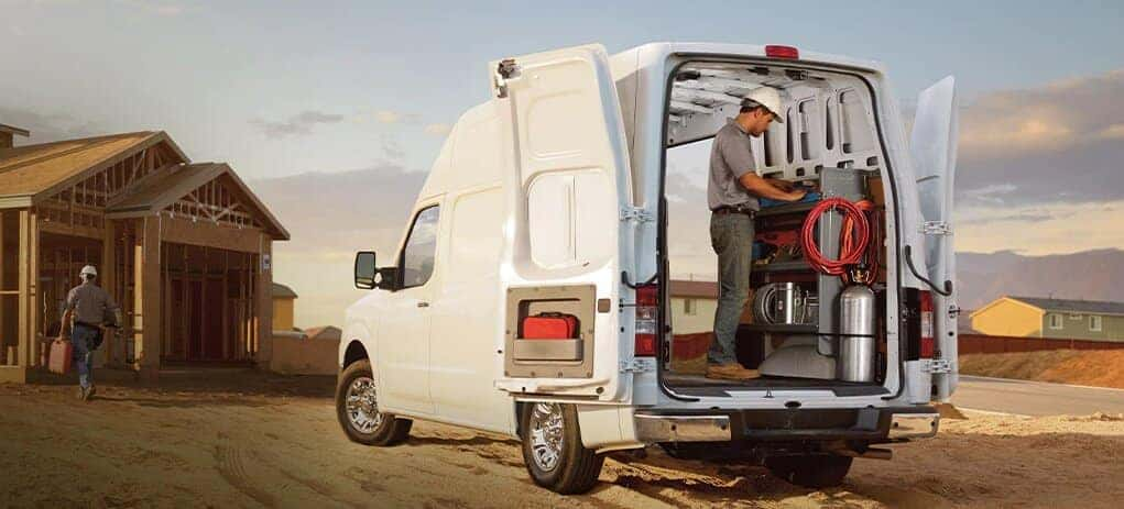 2021 Nissan NV Cargo Van Pictured With Construction Worker at Job Site
