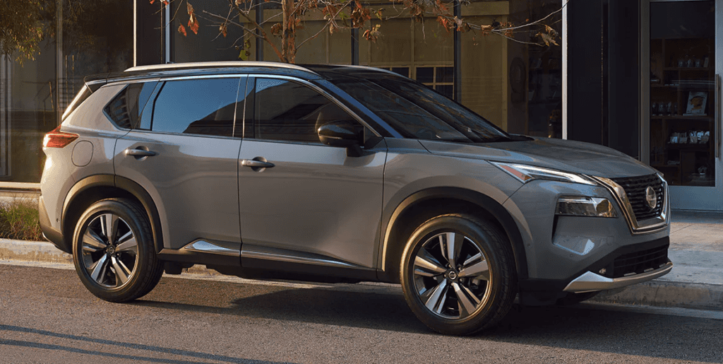 2021 Nissan Rogue in Two Tone Outside of Urban Building