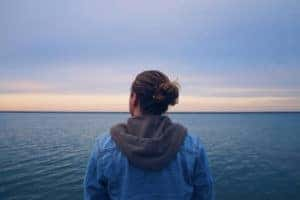 A person staring into the Great Lakes in Cleveland Ohio