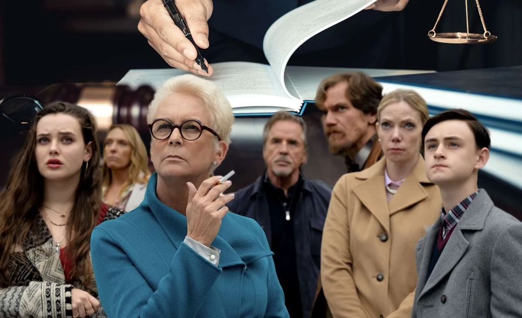 the cast of Knives Out standing distraught with a judge doing paperwork in the background