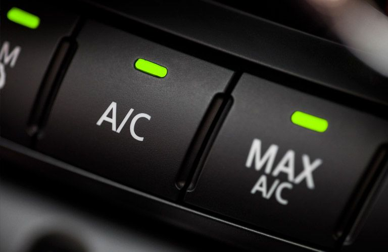 close up view of AC button in a car