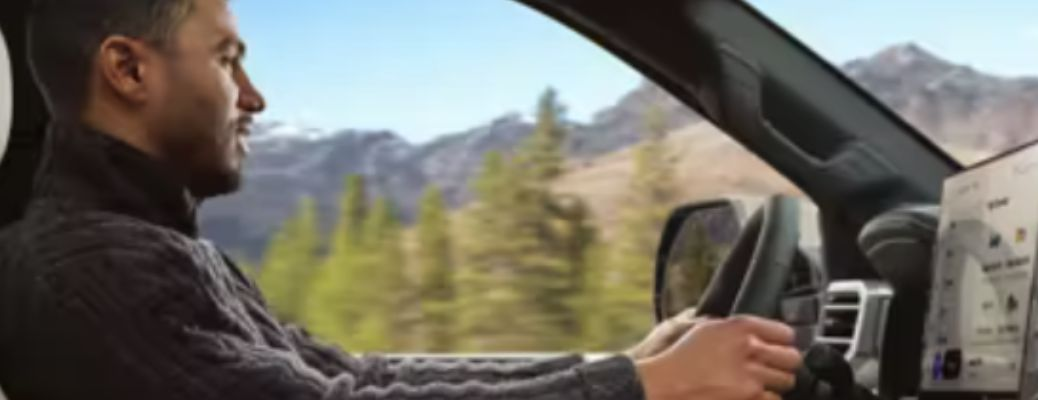 a man driving a car