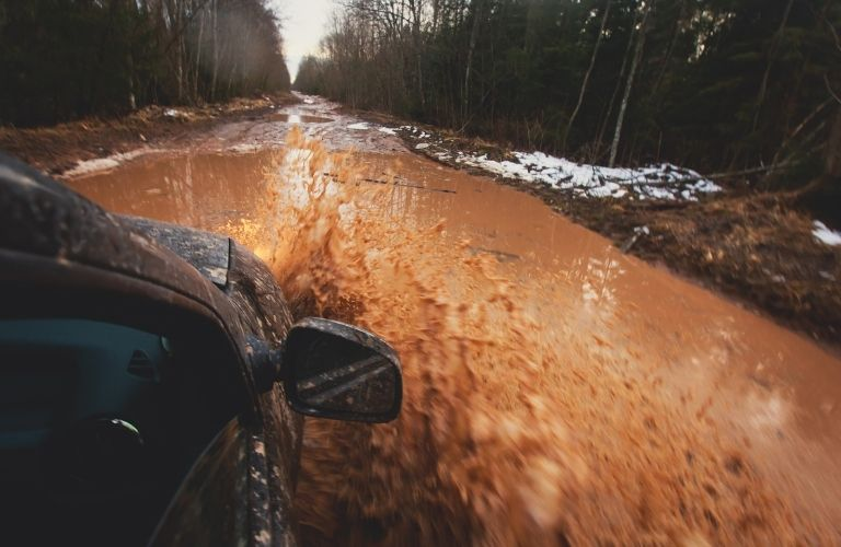 view from a car's window while its off-roading in water