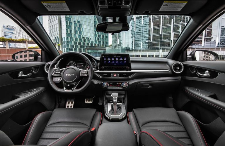 The dashboard view of the 2023 Kia Forte.