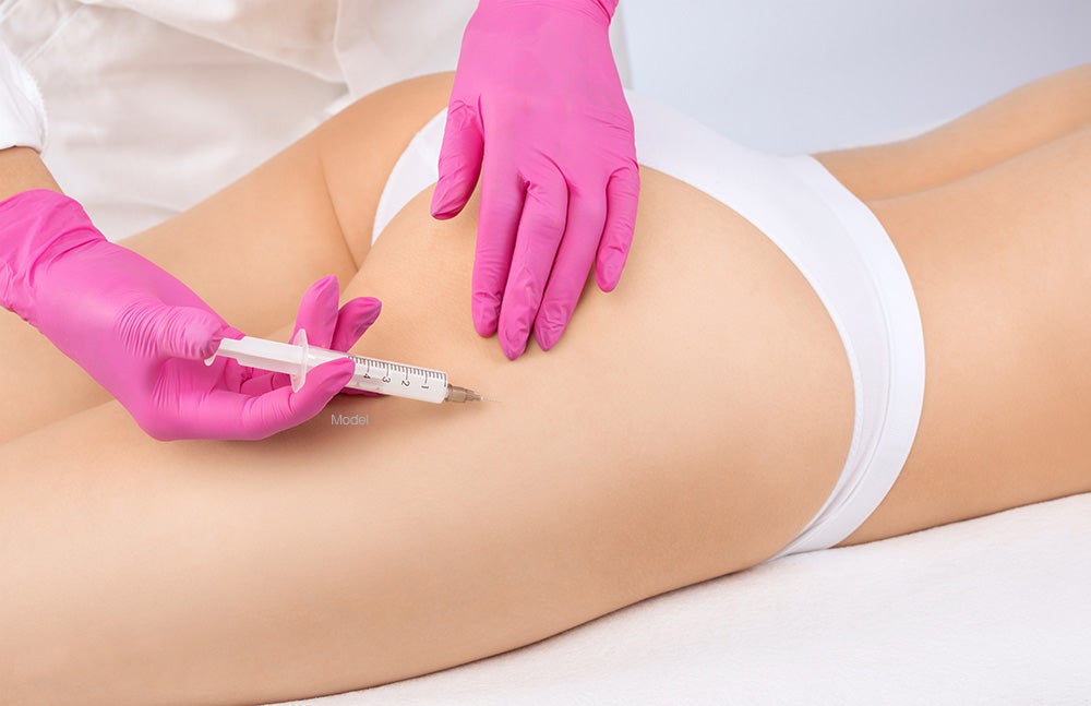 Woman getting a butt injection