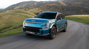 Kia EV blue on road