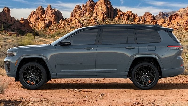 Gray 2027 Jeep Grand Cherokee L in profile in a red-rock desert; Jeep offers at Ross Downing CDJR of Mobile, AL