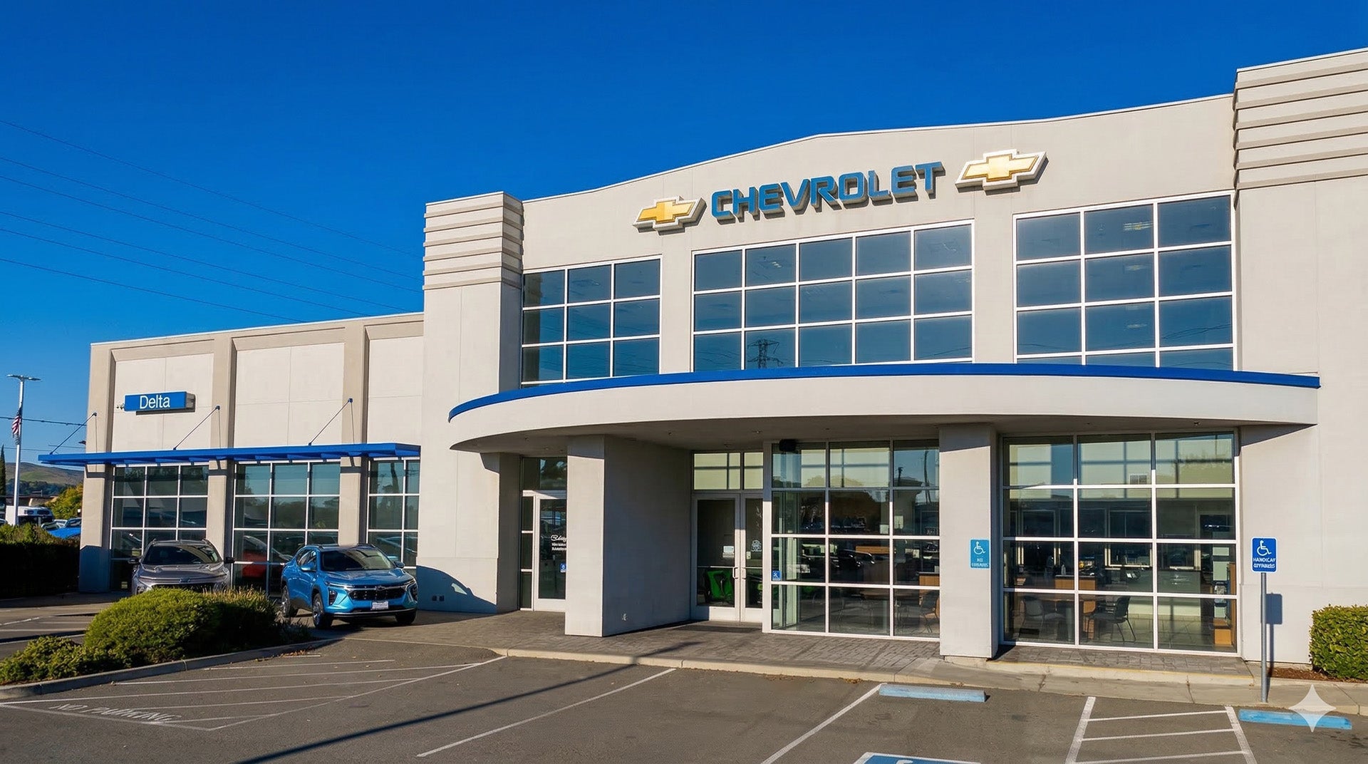 Delta Chevrolet exterior photo showing dealership on a sunny day.