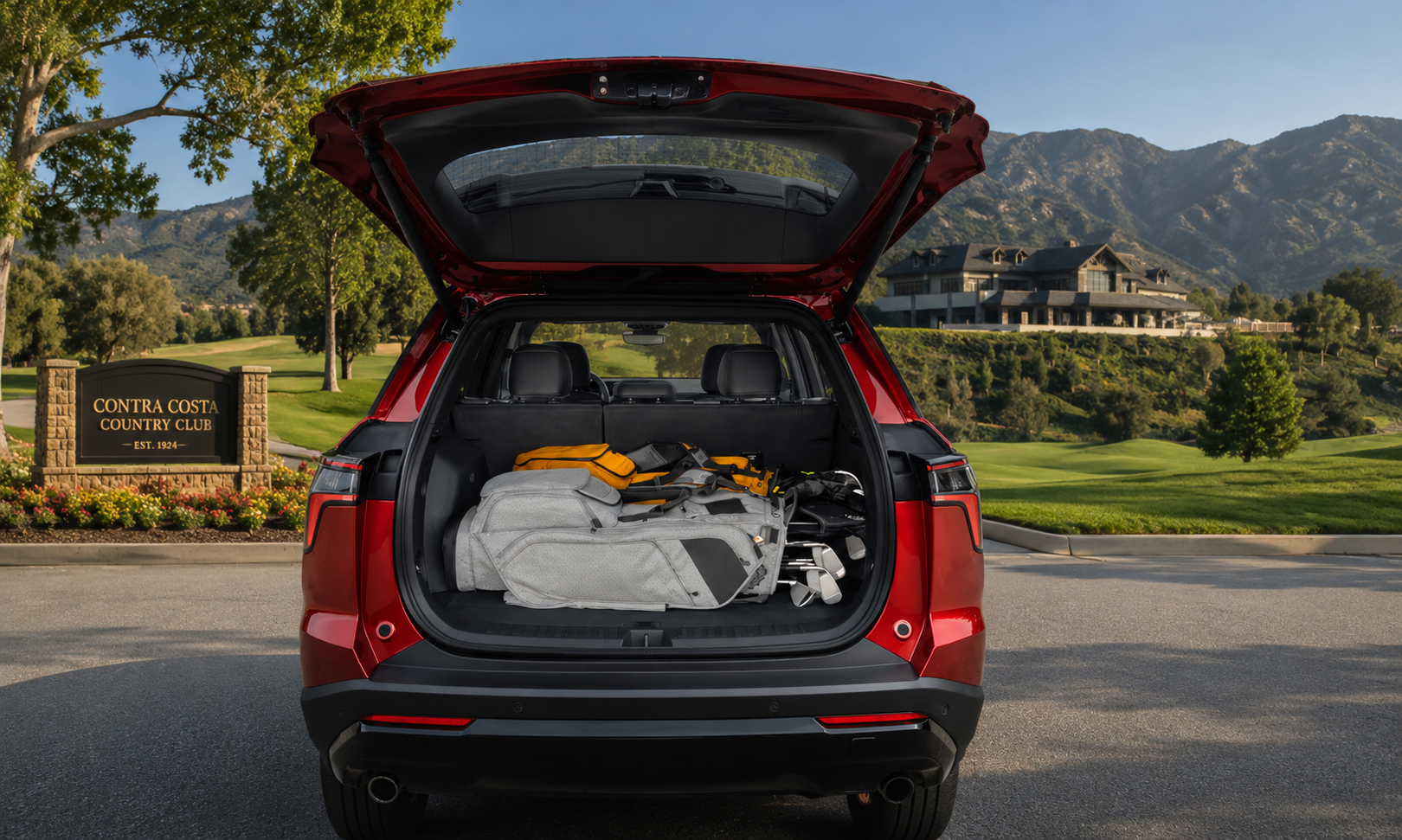 2026 Chevy Equinox showing the cargo space loaded with gold bags outside the Contra Costa Country Country Club