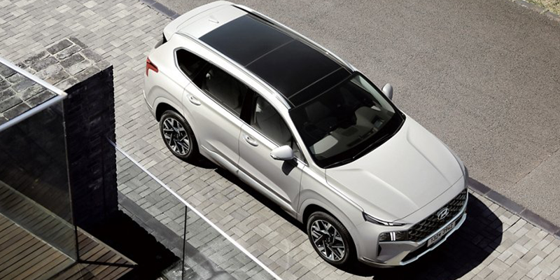 2021 Hyundai Santa Fe of white color and with black sunroof