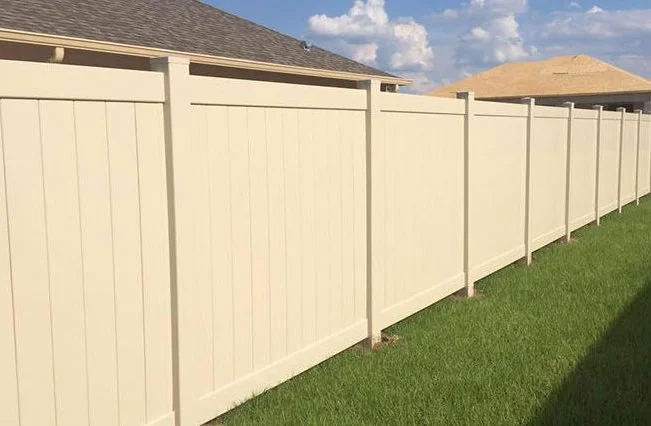 wooden vinyl aluminum fence around a house