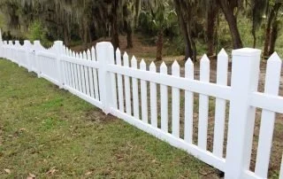 wooden vinyl aluminum fence around a house