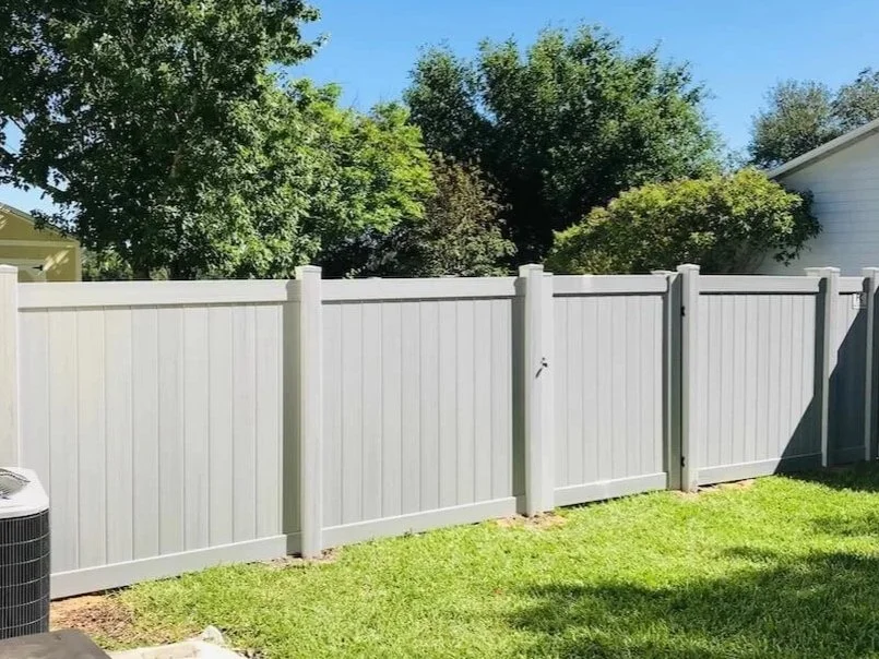 vinyl fence around a house