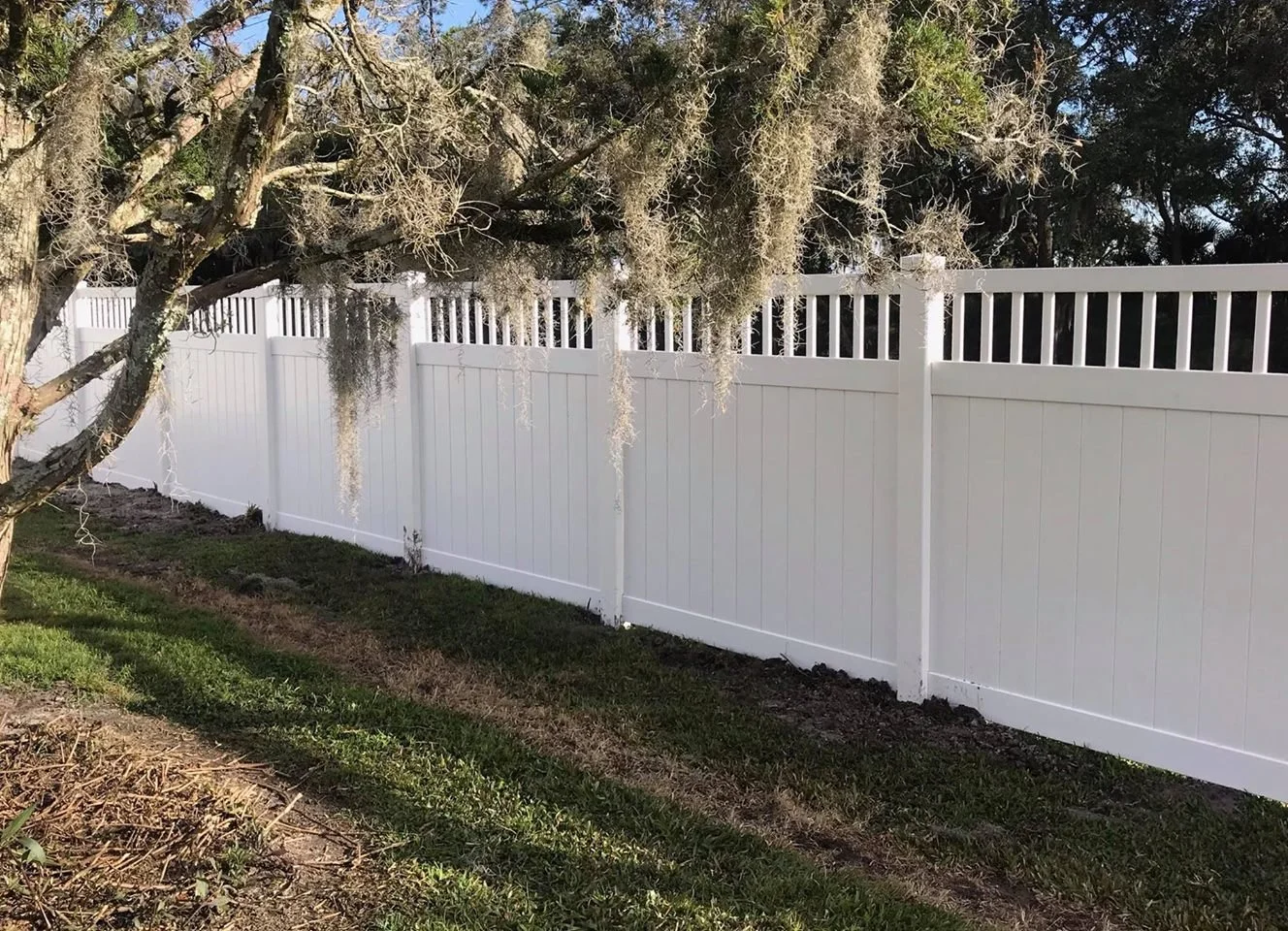 wooden vinyl aluminum fence around a house
