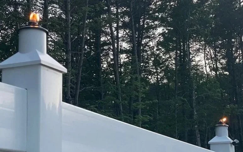 vinyl fence around a house