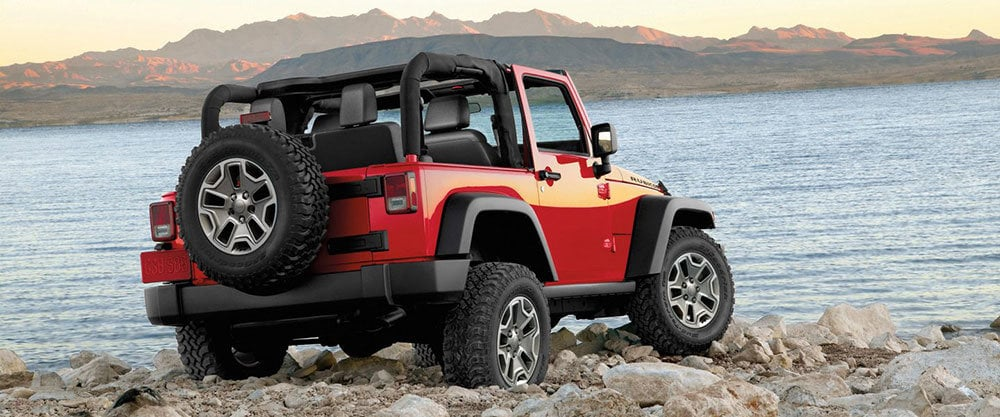 Red Jeep Wrangler.