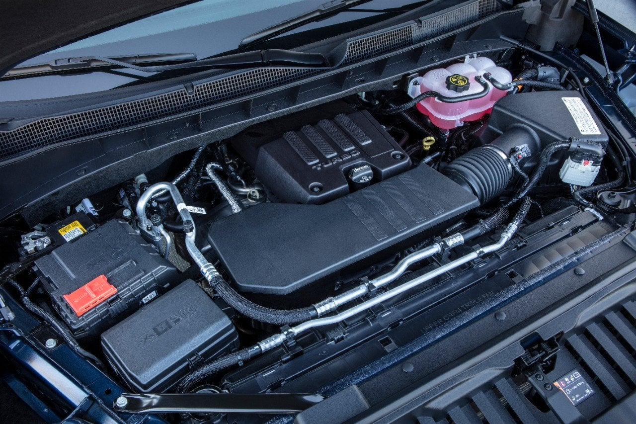 Car battery installed in a vehicle engine compartment