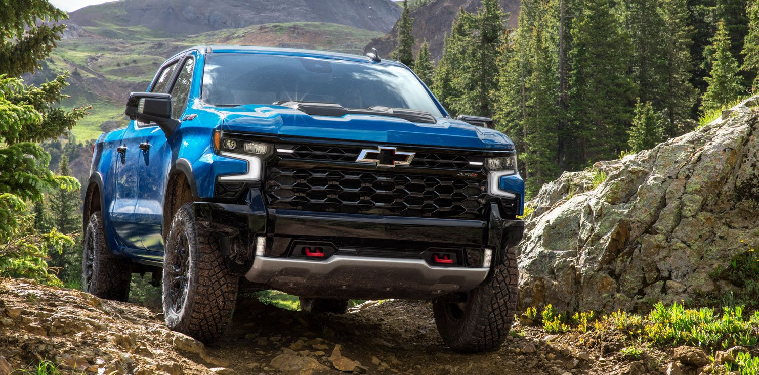 Rear view of a Blue Chevy Silverado pickup truck 