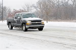 Chevrolet truck in mountain road.