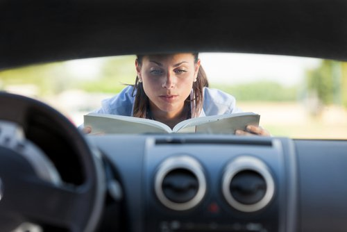 Close-up of a car's black dashboard 